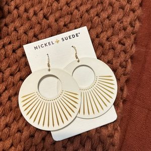 Nickel and suede leather white sunburst novas